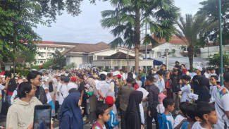 Ribuan Warga Tumpah Ruah di Jalan Sehat Milad Muhammadiyah ke-113 Bogor, Hadiah Umrah Jadi Rebutan