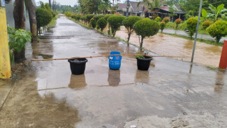 Hujan Deras Sejak Subuh, Akses Jalan Perum Puri Husada Agung Cibinong Terendam Banjir