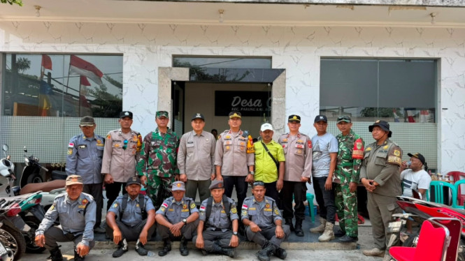 Sinergi Kapolsek dan Danramil Parung mengawal program Pemkab Bogor membuahkan penertiban bangunan liar yang aman