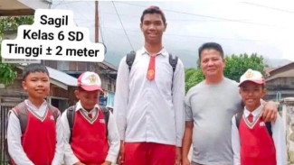 Viral Bocah SD Tinggi Badannya Capai 2 Meter, Bercita-cita Ingin Jadi TNI