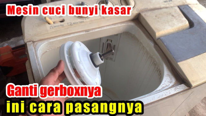 Memperbaiki mesin cuci