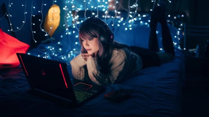 Ilustrasi main laptop gaming