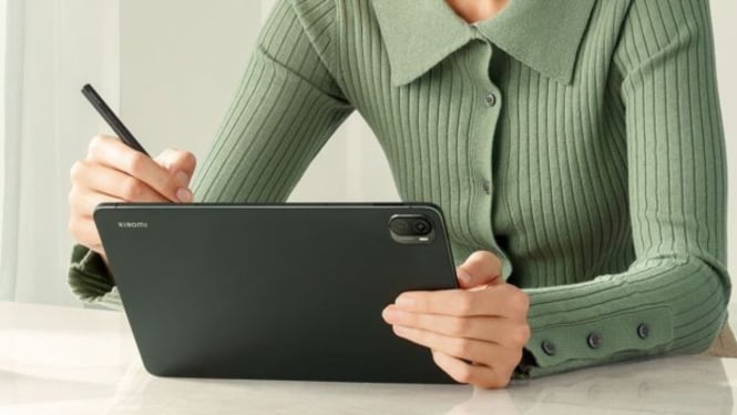 Ilustrasi main tablet