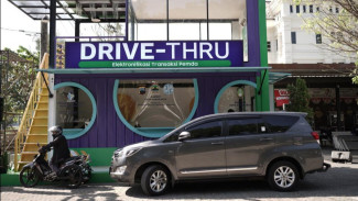 Pertama di Indonesia, Layanan Drive-Thru Grab OVO di Solo untuk ETP
