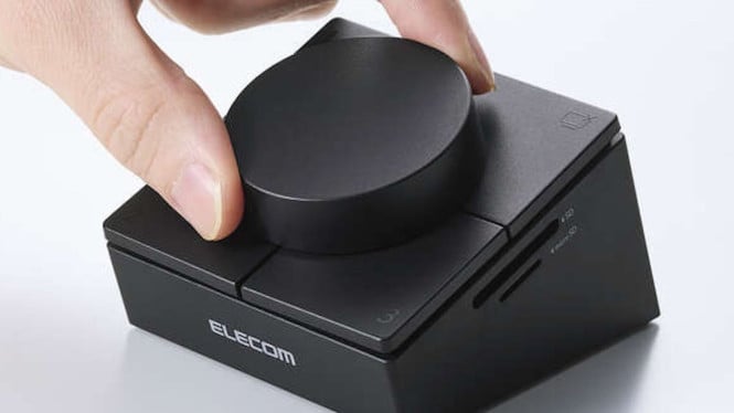Elecom 8-in-1 USB-C docking station menggabungkan fungsi ekspansi port dan kontroler fisik untuk efisiensi kerja.