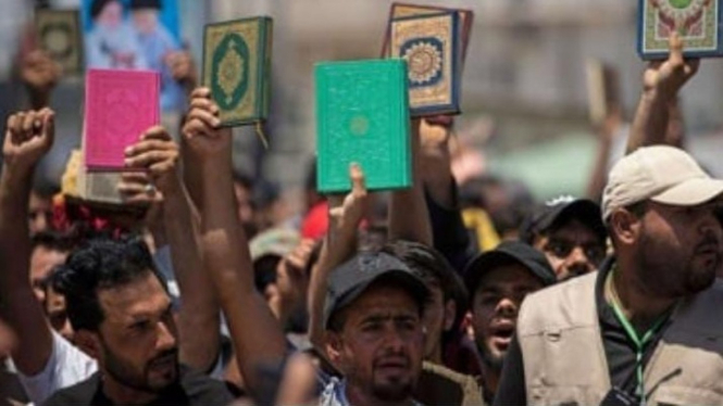 Ilustrasi Penistaan Agama, Protes Aksi Pembakaran Al Quran (Irak)