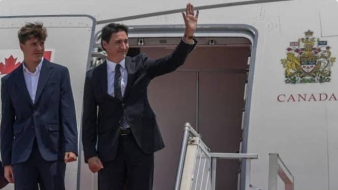 KTT ASEAN ke-43, PM Kanada Justin Trudeau (Kanan) & Anak tiba di RI