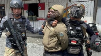 Ditangkap, Tampang Anggota KKB Konara Enumbi Terduga Pelaku Penembakan Polisi