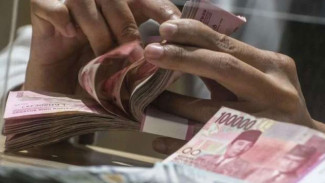 Rupiah Kian Melemah ke Rp18.066 per Dolar AS, Ini Pemicunya