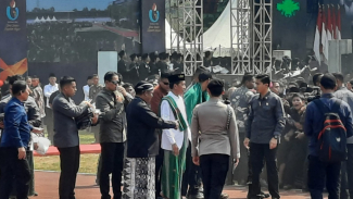 Presiden Jokowi dan Prabowo Subianto di Acara HSN di Surabaya.