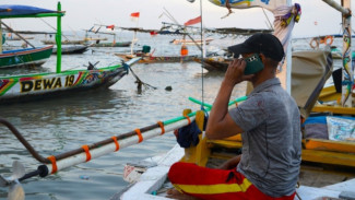 Telkomsel Perkuat Jaringan Telekomunikasi di Kawasan Perairan Teluk Biru
