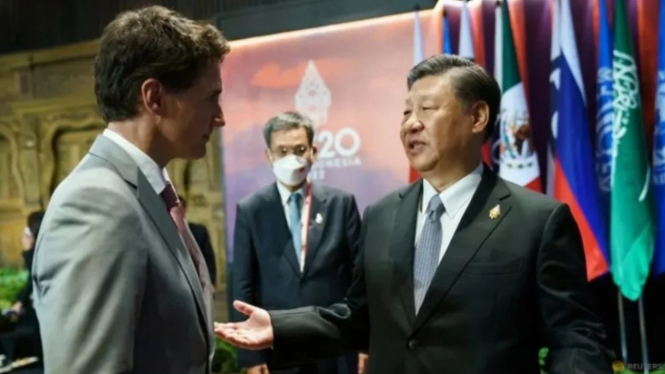 Presiden China X Jinping dan PM Kanada Justin Trudeau di KTT G20.