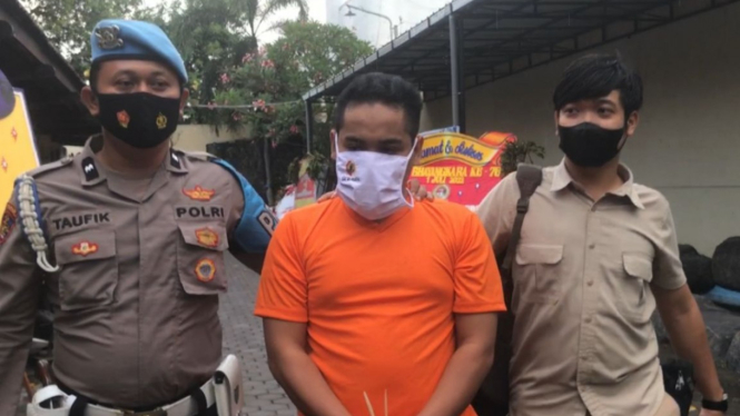 Terdakwa Imam saat ditahan di Polres Mojokerto.