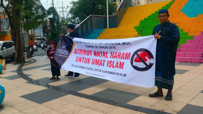 Aksi Jama'ah Ansharu Syariah yang dinilai intoleran jelang Natal.