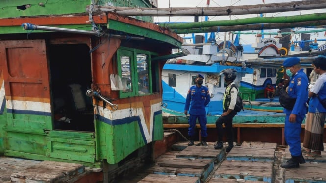 Sejumlah polisi saat mendatangi lokasi kejadian