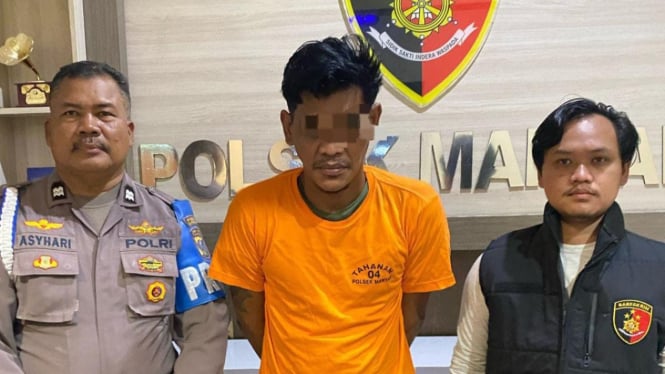 Pelaku DCC saat dibekuk polisi.