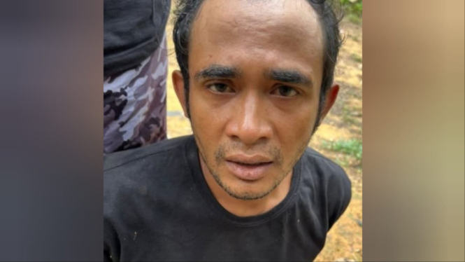 Ahmad Midhol saat ditangkap polisi.
