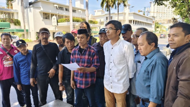 Pembacaan pernyataan sikap Trio Marpaung.