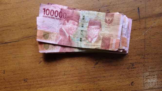 Barang bukti uang palsu.