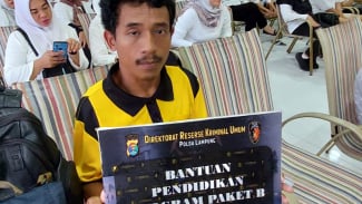 Yepin, seorang pekerja harian lepas (PHL) Polda Lampung. Yepin, seorang pekerja harian lepas (PHL) Polda Lampung.