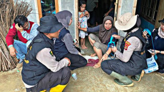 Polda Lampung Tak Hanya Evakuasi, Korban Banjir Dapat Trauma Healing