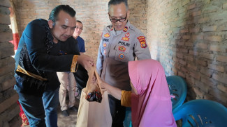 Jalin Sinergi, Polres Lampung Selatan dan Nirwana Resort Gelar Bakti Sosial di Merak Belantung