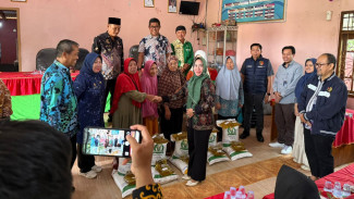 Polda Lampung Dampingi Bapanas Salurkan Bantuan Pangan untuk 280 KPM di Tubaba