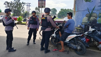 Ciptakan Rasa Aman, Brimob Kompi 2 Batalyon A Pelopor Gelar Patroli Dialogis di Bandar Lampung