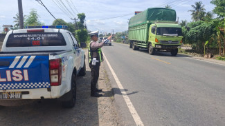 Pastikan Kamseltibcarlantas, Sat Lantas Polres Tulang Bawang Perketat Patroli di Titik Rawan Laka