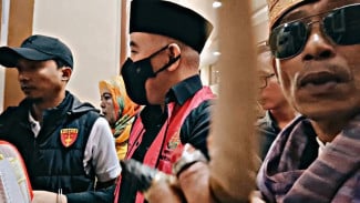 Ponsel Wartawan Dipukul Saat Meliput Sidang Korupsi SPAM Pesawaran