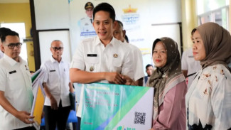 Lindungi Pekerja Rentan, Pemkab Lampung Selatan Gelar Roadshow Pembagian Kartu BPJS Ketenagakerjaan