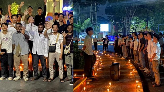 Mahasiswa Unila menggelar aksi 1000 lilin.