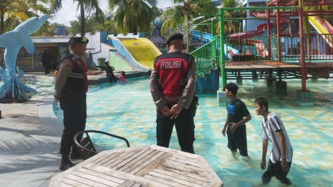 Polres Tulang Bawang lakukan patroli di lokasi wisata.