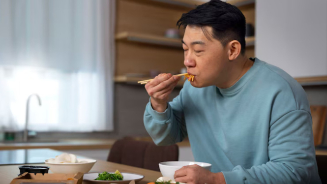 Ilustrasi orang makan