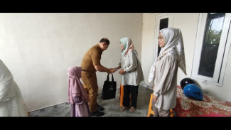 Istri korban KRI Nanggala-402, Sosok Guru Yang Bekerja Dengan Jarak Tempuh 90 KM