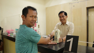 Hari Pelanggan Dirut Tugu Tirta Turun Langsung Berikan Pelayanan