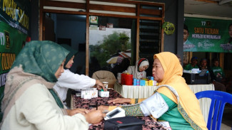 Relawan Asandra Beri Pengobatan Gratis Untuk Warga Kota Batu