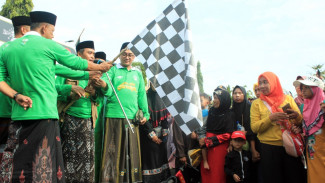 Ribuan Warga Pasuruan Meriahkan Jalan Sehat Sarungan, Mas Adi Tekankan Pentingnya Sinergi