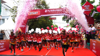 Fitur Lari Telkomsel Diperkenalkan Dalam Fun Run Korem 083 Baladhika Jaya