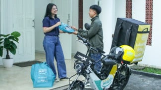 Dukung Gaya Hidup Berkelanjutan, Less Worry Laundry Gunakan Motor Listrik Ramah Lingkungan