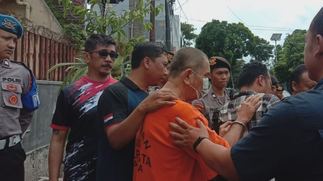 Rekonstruksi pembunuhan dan mutilasi di Malang