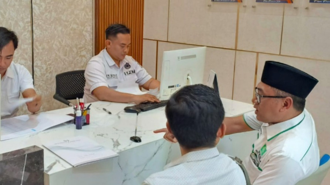 Ketua DPC PKB Kota Pasuruan saat lapor ke polisi.