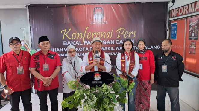 Heri Cahyono dan Ganis Rumpoko saat daftar di KPU Kota Malang