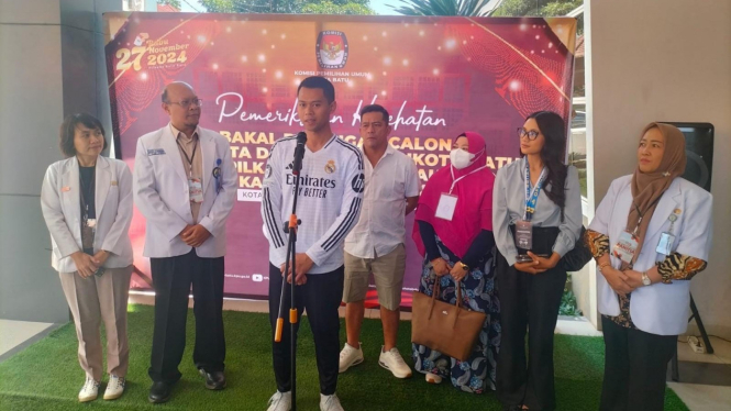 Calon Wali Kota Batu, Mas Gum kenakan jersey Real Madrid.