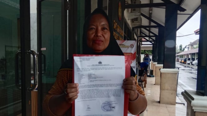Korban saat melapor ke Polisi.