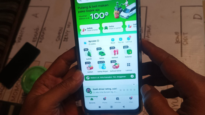 Ilustrasi aplikasi ojek online