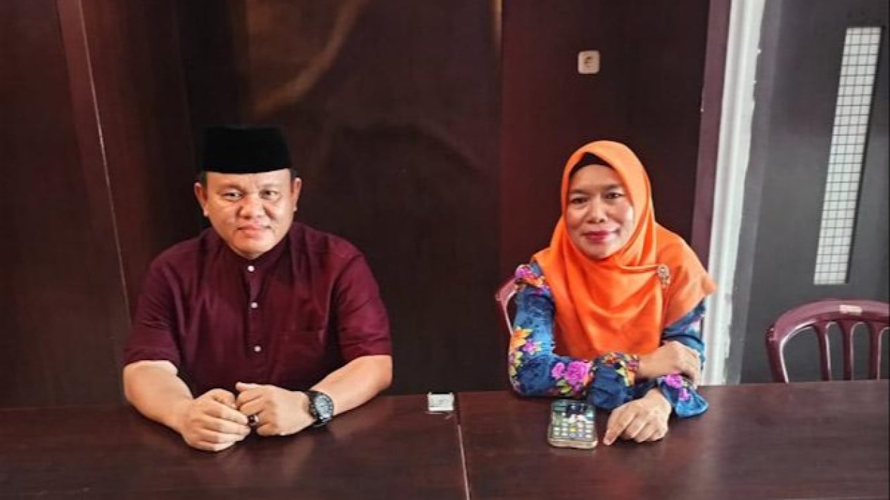 Hj Erna Suriani (kanan) tak diakomodir sebagai Dewan Hakim MTQ ke-58 Kota Medan.