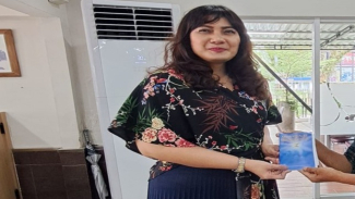 Suryani Paskah Naiborhu. Suryani Paskah Naiborhu.
