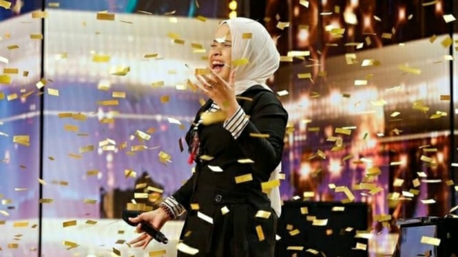 Ekspresi Putri Ariani ketika mendapat Golden Buzzer di America's Got Talent 2023.