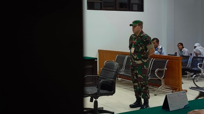 Pratu Richal Aluan Alunpah menjalani sidang di Pengadilan Militer 1-02 Medan.